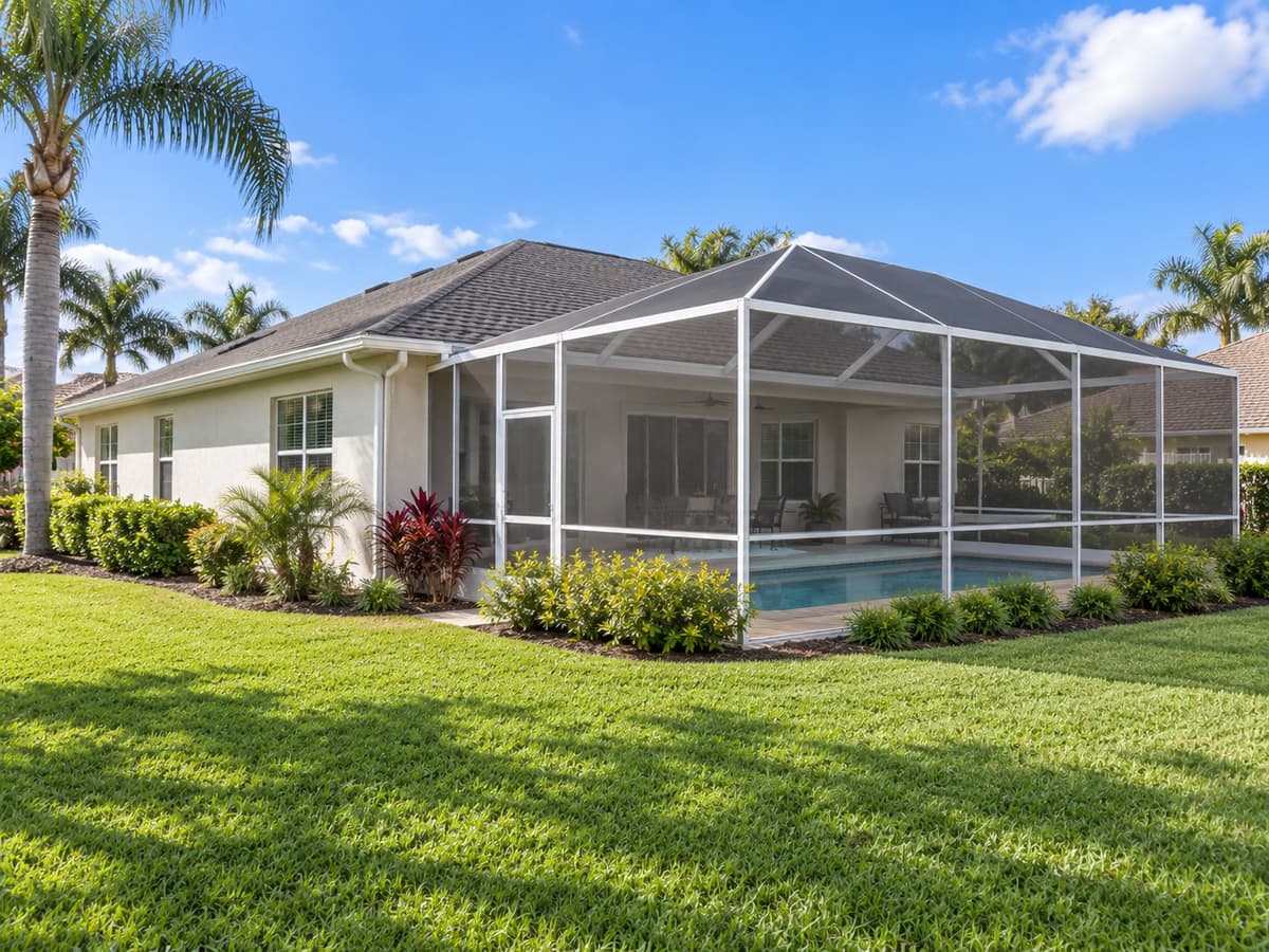 Screen pool enclosure on a modest single story Florida home